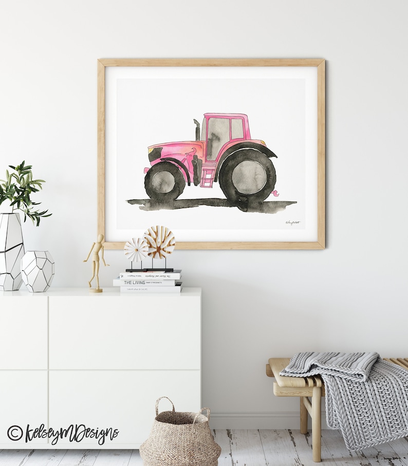 May include: A watercolor painting of a pink tractor on a white background. The tractor has black wheels and a black exhaust pipe.