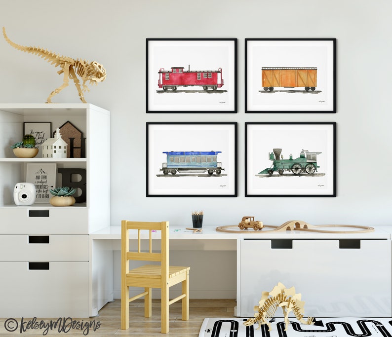May include: Four watercolor paintings of vintage train cars and a locomotive. The paintings are framed in black and hung on a white wall. The paintings are in a children's room with a wooden desk, a chair, and a dinosaur toy.