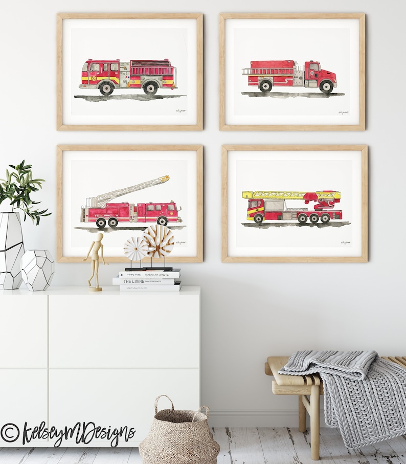 May include: Set of four watercolor paintings of red fire trucks with ladders. The trucks are on a white background with a light wood frame.