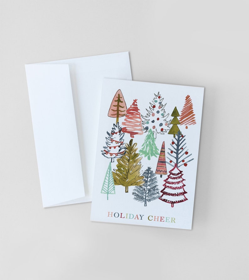 May include: A Christmas card with a white background and a colorful illustration of a group of stylized Christmas trees. The text "HOLIDAY CHEER" is printed in colorful letters at the bottom of the card.