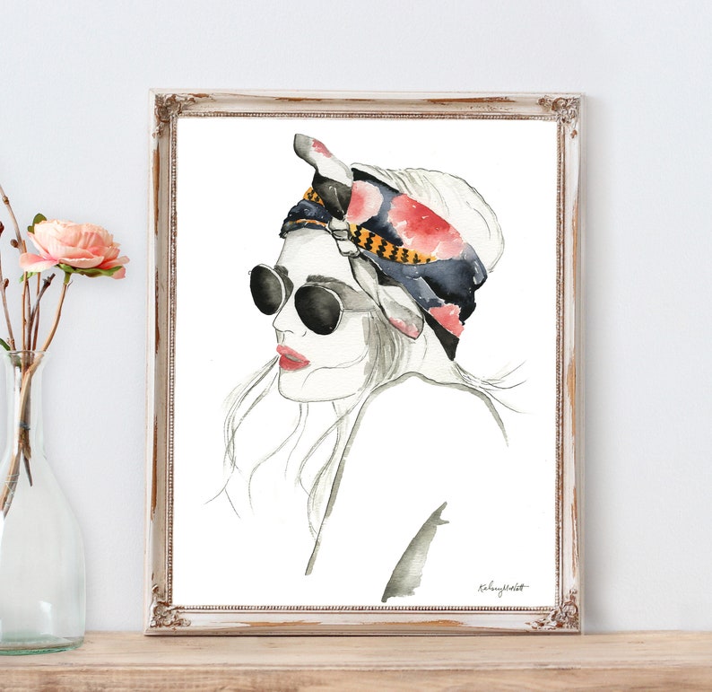 May include: Watercolor illustration of a woman with long hair wearing round sunglasses and a blue, red, and yellow patterned headscarf.