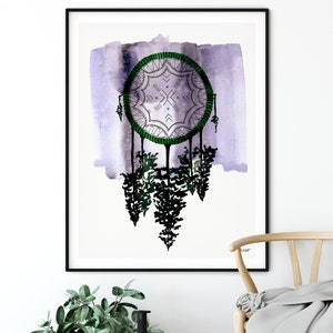 May include: A watercolor painting of a dreamcatcher with a purple and green color scheme. The dreamcatcher is hanging from a purple watercolor background. The dreamcatcher has a green beaded border and a white lace design.