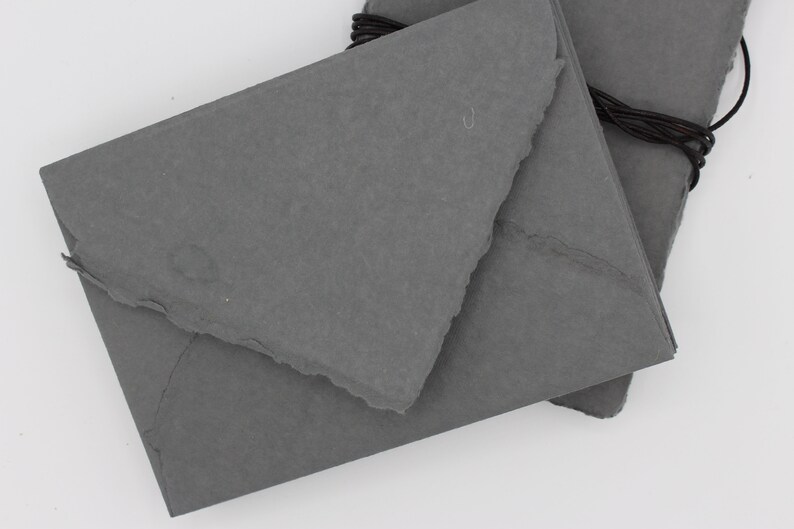 A7 envelopes, wedding envelopes, envelopes for wedding, rag paper envelopes, gray grey envelopes, thick wedding envelopes, deckled edge envelopes, torn edge envelopes, wedding invitations, DIY wedding invites, grey wedding invites, gray wedding Inspo