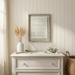 Personalized first anniversary gift showcasing wedding vows on handmade deckled-edge paper in a modern wood frame.