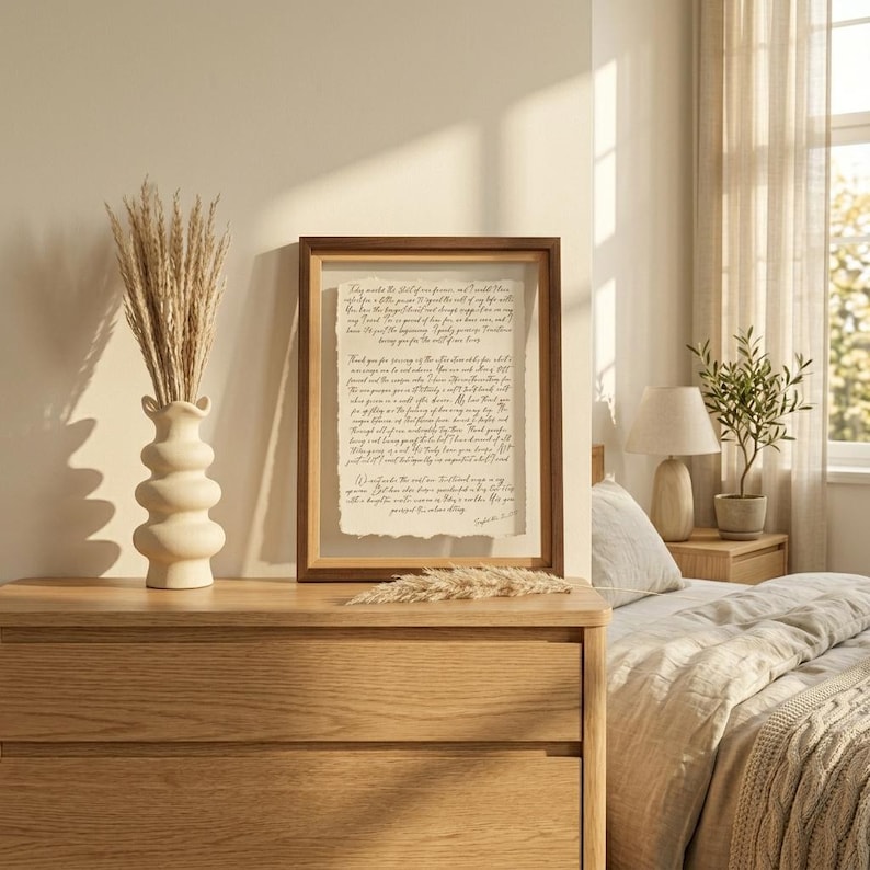 Framed anniversary gift featuring personalized wedding vows printed on handmade deckled-edge cotton paper in a walnut float frame.