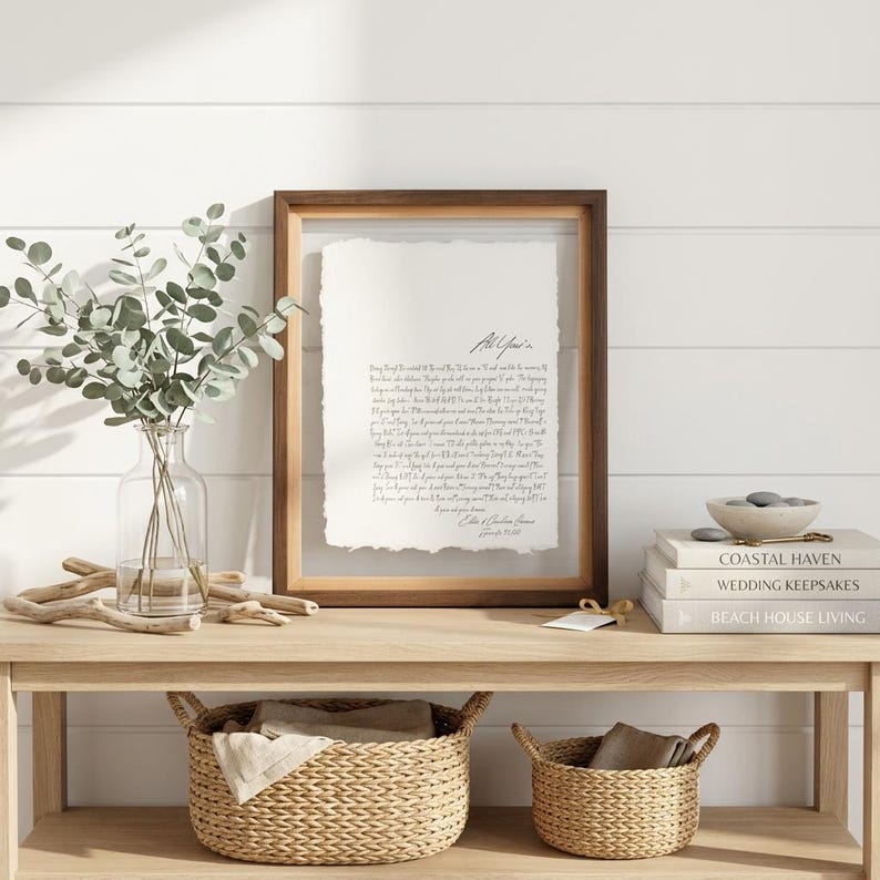 Personalized first dance song lyrics printed on handmade deckled-edge cotton paper and beautifully displayed in a premium float frame. This custom wedding keepsake features the lyrics from a couple's first dance song, creating a meaningful anniversary gift or wedding memory. Elegant home decor crafted from luxurious cotton paper with visible deckled edges. Perfect for weddings, anniversaries, newlyweds, and romantic gift-giving, preserving a special moment in timeless artwork.
