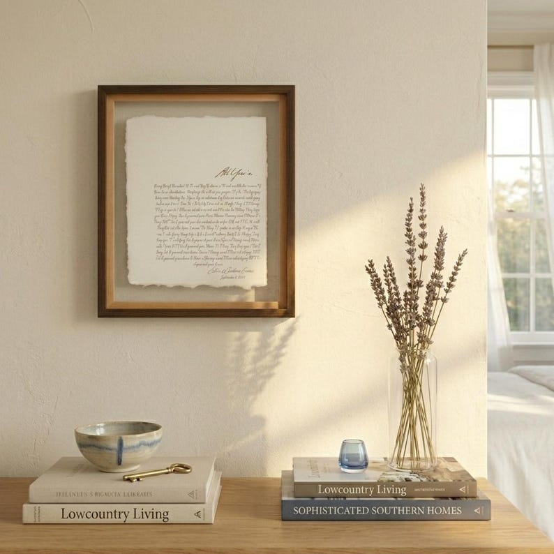 Personalized first dance song lyrics printed on handmade deckled-edge cotton paper and beautifully displayed in a premium float frame. This custom wedding keepsake features the lyrics from a couple's first dance song, creating a meaningful anniversary gift or wedding memory. Elegant home decor crafted from luxurious cotton paper with visible deckled edges. Perfect for weddings, anniversaries, newlyweds, and romantic gift-giving, preserving a special moment in timeless artwork.