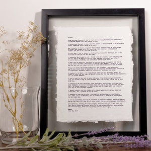 May include: A framed black and white vintage typewriter letter with a handwritten message on aged paper. The letter reads "From this day forward, I vow to start each morning by making an intentional, deliberate choice. Rachel, that choice is you."