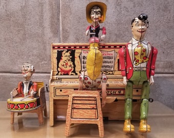 Vintage Li'l Abner Tin Lithograph Mechanical Wind-Up Piano Band Toy