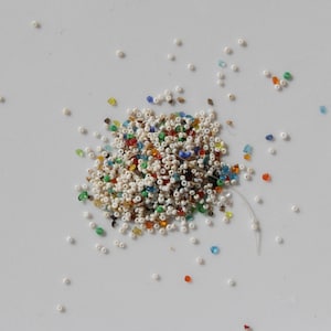 Micro mix size 16/0 to 20/0 Opaque white, green, black, and chip mix.  3 grams Antique Murano glass micro seed beads vintage Italian