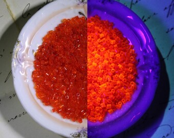 2 mm Bittersüße Orange transparent Antik 2-Schliff / Neon Orange Antik Murano Glas Perlen, italienische Schwarzlicht UV-aktive kurze Signalhörner