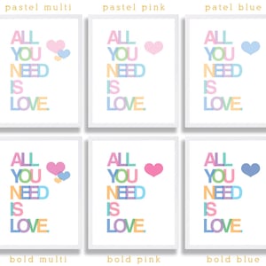 May include: Six printable wall art prints with the text "All You Need Is Love" in different color combinations. The prints feature a heart in the top right corner of each print. The color combinations are pastel multi, pastel pink, pastel blue, bold multi, bold pink, and bold blue.