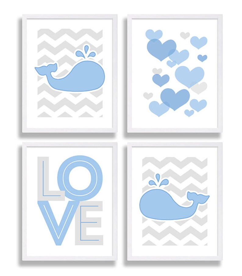 May include: Set of four framed prints with a blue whale and chevron pattern, a blue whale with water droplets, a blue whale with hearts, and the word "LOVE" in blue and gray.