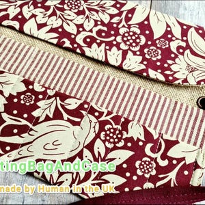 May include: A handmade knitting bag and case with a burgundy floral and bird pattern on a cream background. The bag features a striped section and a burgundy strap. The text "KnittingBagAndCase" and "Handmade by Human in the UK" are visible.