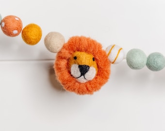 Guirnalda de leones de fieltro: decoración infantil de safari