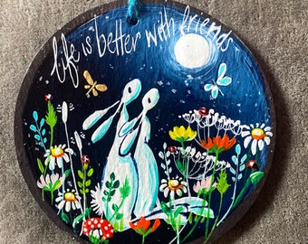 Life is better with friends. Two hares looking at the moon, hand painted on slate. Perfect unique gift for a friend you love.