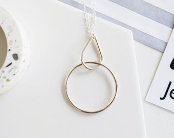 Silver teardrop and circle pendant