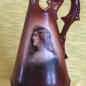 Limoges A. Klingberg & Dwenger 6 inch Austrian Porcelain Potrait Ewer. c. P1890-1910.