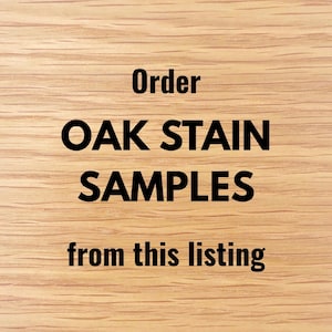 May include: A light brown oak wood grain surface with the black text Order OAK STAIN SAMPLES from this listing centered on the image. The wood features a natural horizontal grain pattern with visible light and dark tan wood fibers throughout.