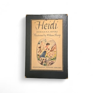 May include: A vintage hardcover book titled "Heidi" by Johanna Spyri, illustrated by William Sharp. The cover features a color illustration of a girl with goats and a boy. The book is part of the "Illustrated Junior Library" series.