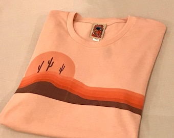 Mens 70s salmon Desert Horizons tee | Soft 1970s style desert peach coral pink orange and brown graphic retro tshirt | Cactus shirt