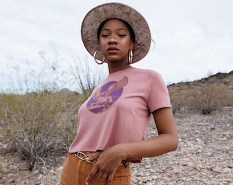 70s Mauve Pegasus Cropped Tee | womens pink flowy 1970s style loose crop top 50/50 soft thin summer festival top Unicorn Winged Horse