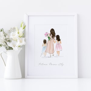 May include: A framed art print featuring a mother and two daughters walking away, holding hands. The mother wears a pink dress and carries flowers. The daughters wear a light blue and pink dress. The print is in a white frame.