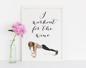 May include: A white framed print with a black and white illustration of a woman doing a plank exercise with a glass of wine in front of her. The text on the print reads "I workout for the wine".