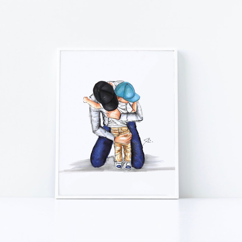 May include: A drawing of a father and son hugging. The father is wearing a white shirt, blue jeans, and a black baseball cap. The son is wearing a white shirt, khaki pants, and a blue baseball cap.