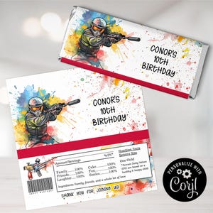 May include: A colorful watercolor design with a paintball player holding a gun. The design is for a chocolate bar wrapper and includes the text "Conor's 10th Birthday".