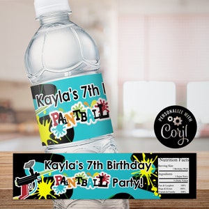 May include: Water bottle label featuring a blue, black and yellow paintball design. The label reads "Kayla's 7th Birthday Paintball Party!" and includes a personalised message that says "Personalize with Coril".