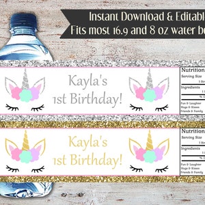 May include: Printable water bottle labels featuring a unicorn with a gold horn, pink and blue flowers, and closed eyes. The labels are decorated with silver and gold glitter and say "Kayla's 1st Birthday!" with a nutrition facts label listing "Fun & Laughter", "Hugs & Kisses", and "Friends & Family" as ingredients.