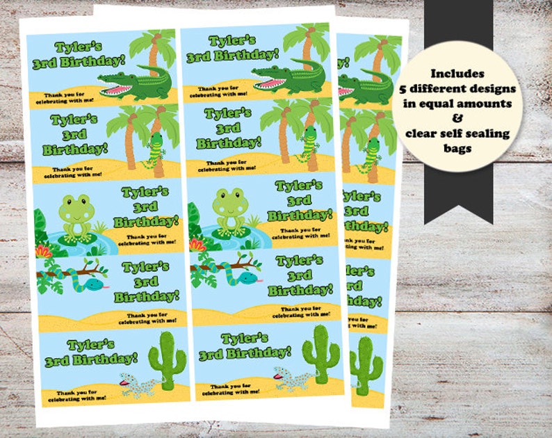 May include: A set of 5 different favor bag designs for a 3rd birthday party. The designs feature a blue background with a variety of jungle animals, including a frog, snake, alligator, and lizard. The text on the bags reads "Tyler's 3rd Birthday!" and "Thank you for celebrating with me!"