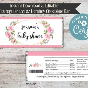 May include: Pink and white printable baby shower chocolate bar wrapper with a floral design and the text "jessica's baby shower". The wrapper is designed to fit a 1.55 oz Hershey chocolate bar. The wrapper also includes a nutrition facts label with the text "Sleepless Nights, Diaper Changes, Proud Parents, Hugs and Kisses".