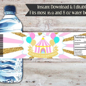 May include: Pink and gold printable water bottle label with a circus tent and balloons. The label says "Kailyn's 2nd Birthday".