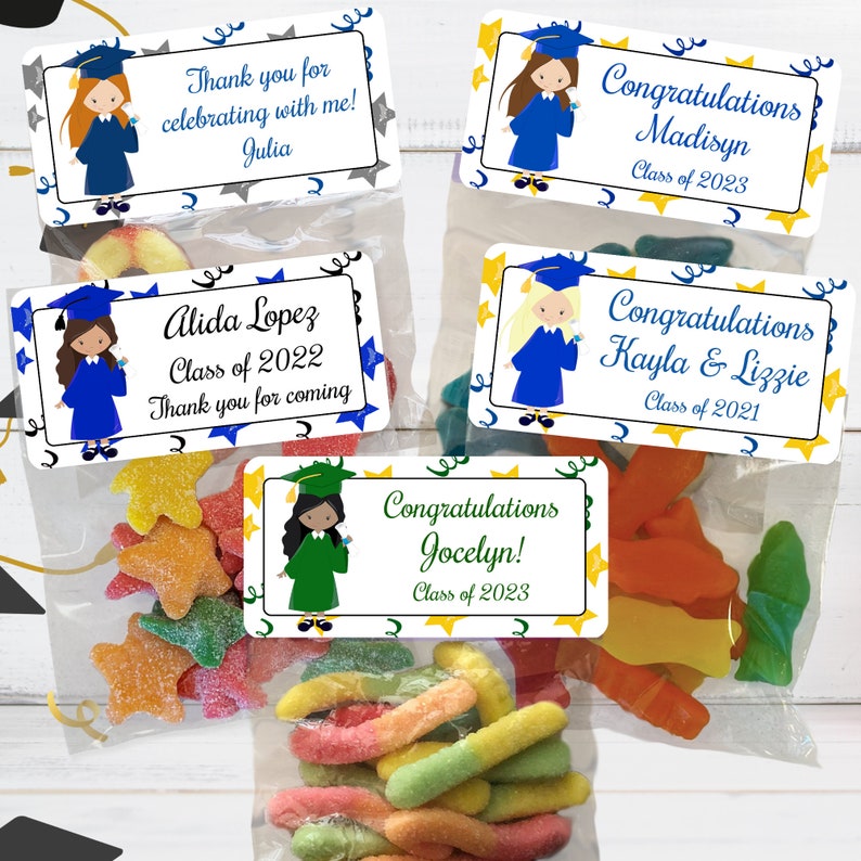 May include: Four graduation party favor bags with colorful candy and personalized labels. The labels feature a cartoon girl wearing a graduation cap and gown, with the graduate's name and graduation year. The labels also include the text "Congratulations" and "Thank you for coming".