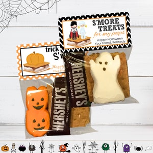 May include: Two clear plastic treat bags containing s'mores ingredients. One bag has a topper with a vampire and mummy illustration, text reading S'MORE TREATS for my peeps, and a ghost-shaped marshmallow. The other has a pumpkin topper.