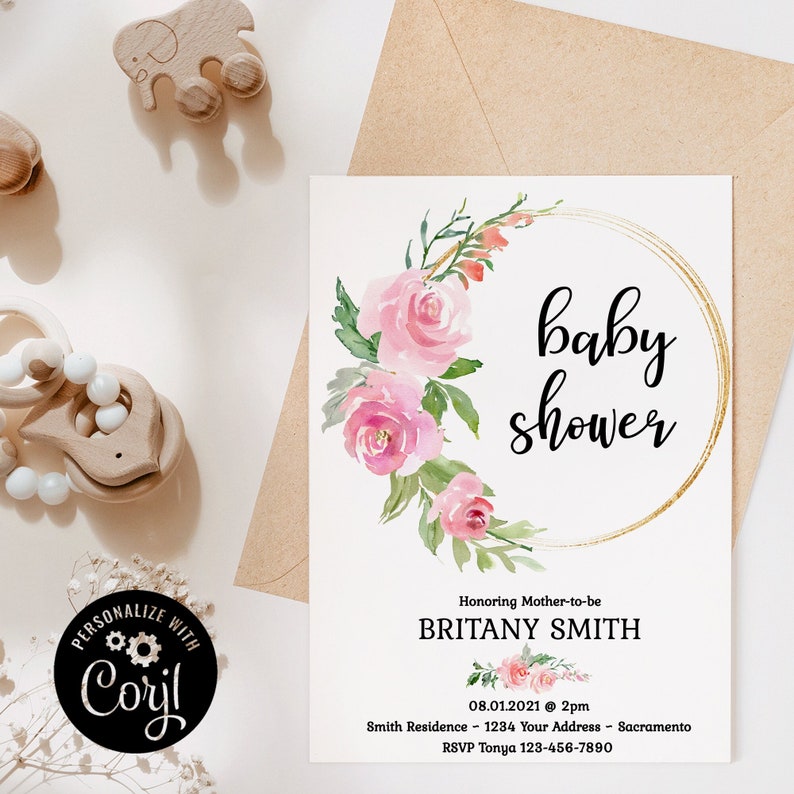 May include: A baby shower invitation with a pink floral wreath and gold circle. The text reads "baby shower" and "Honoring Mother-to-be BRITANY SMITH". The date and time are 08.01.2021 at 2pm. The location is Smith Residence 1234 Your Address - Sacramento. The RSVP information is RSVP Tonya 123-456-7890.