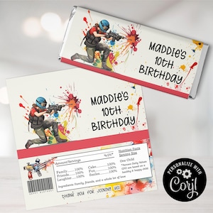 May include: A colorful chocolate bar wrapper with a paint splatter design. The wrapper features a girl in a paintball suit holding a paintball gun. The text on the wrapper reads "Maddie's 10th Birthday".