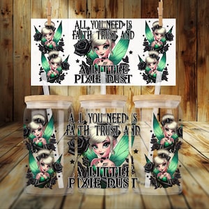 May include: Glass tumblers with wooden lids feature a fairy design with green wings, black roses, and the text "ALL YOU NEED IS FAITH TRUST AND A LITTLE PIXIE DUST." The tumblers are clear with a straw.