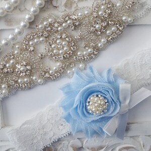 TLG511 - Pretty Ivory Wedding Garter With Diamante Brooch Detail