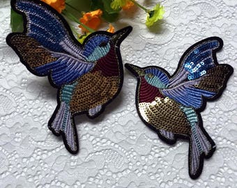 Une paire d'oiseaux brodés à sequins pour appliques de décoration de vêtements ou de robes