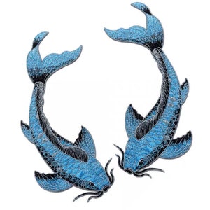 May include: Two blue and black embroidered koi fish patches. The fish are facing each other with their mouths open.