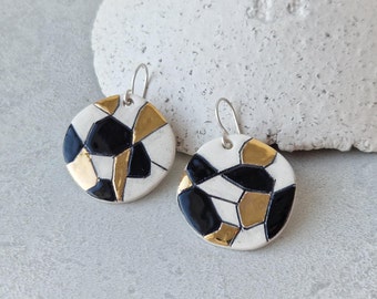 Geometric ceramic earrings in black, white and gold