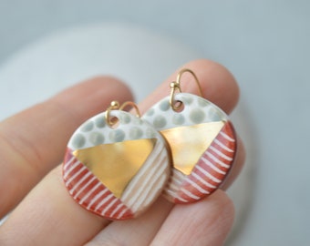 Handmade ceramic earrings in cinnamon red and gold