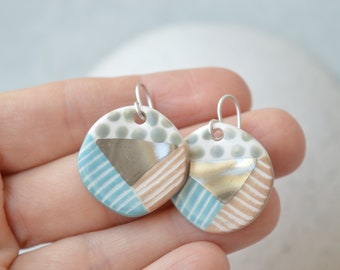 Handmade ceramic earrings in blue and silver