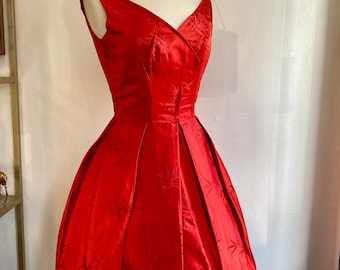 1950s red satin 27" waist party cocktail dress - bamboo brocade print