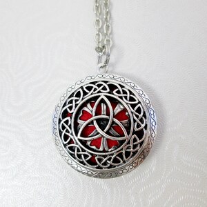 trinity knot aromatherapy necklace, antique silver color.