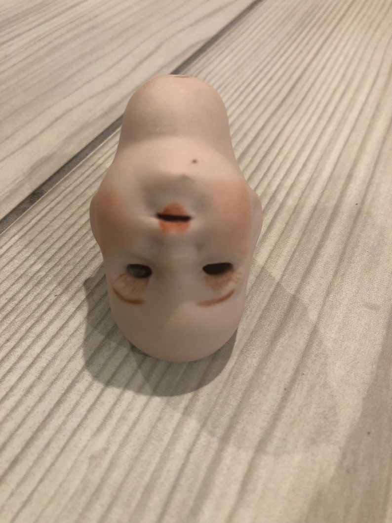 Vintage porcelain doll head