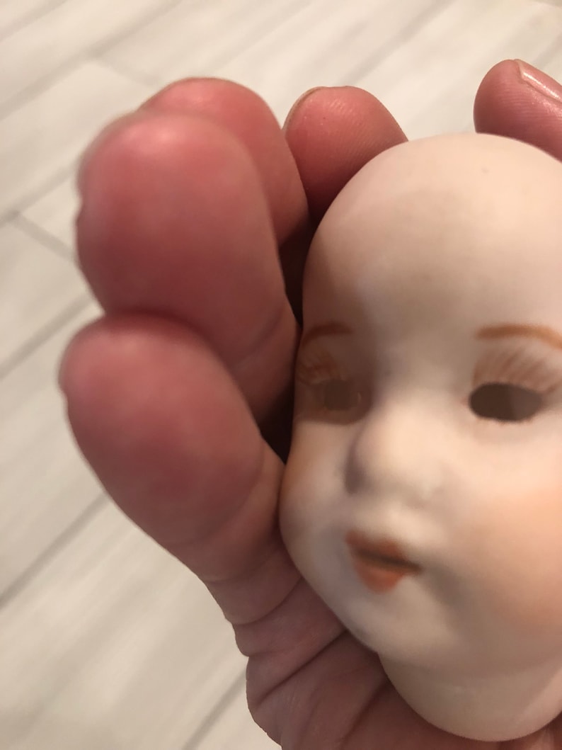 Vintage porcelain doll head